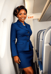 Elegant Flight Attendant with Timeless Grace
