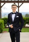 Dapper Young Man in a Classic Black Tuxedo