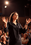 A New Dawn: Young Woman Commanding the Stage
