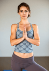 Strength in Stillness: Female Instructor's Poised Posture