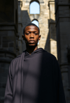 The Soul's Solitude: Young Monk in Reflection