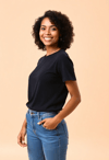 Stylish and Confident: Woman in Black Tee