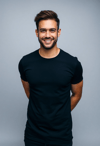 Confident Cool: Man in Sleek Black Shirt