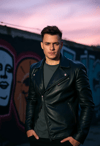 Contemporary Flair: Man in Fitted Leather Jacket