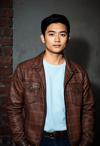 Effortless Style: Man in Distressed Leather Jacket