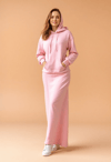 Casual Confidence: Woman in Pink Hoodie Dress