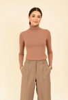 Effortless Elegance in Taupe Turtleneck