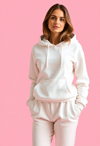 Effortless Elegance: Woman in White Hoodie