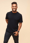Inspiring Charm: Man in Black Tee
