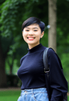 Joyful Young Woman in the Park