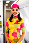 Confident Stewardess Greeting Passengers