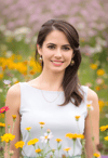Elegant Woman in Spring Meadow