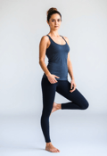 Graceful Balance: Female Yoga Instructor in Motion