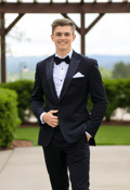 Dapper Young Man in a Classic Black Tuxedo