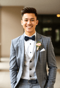 Young Man in a Modern Gray Suit