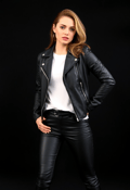 Modern Maverick: Stylish Woman Biker with Bold Attitude