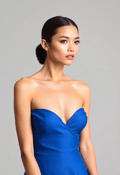 Poised Skinny Woman in Blue Elegance