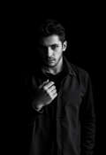 High Contrast Intrigue: Man in Thought
