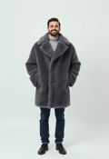 Winter Warmth: The Cozy Embrace of a Grey Fur Coat