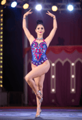 Enchanting Aerialist in a Whirl of Colors