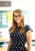 Cute Female Nerd with a Polka Dot Dress