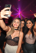 Urban Kings and Queens: Group Selfie Under Club Lights