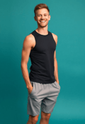 Slender Man in Casual Attire with a Teal Background