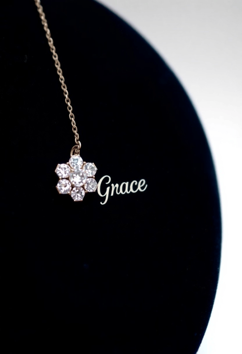 Delicate Diamond Cluster Necklace Cradling a Name