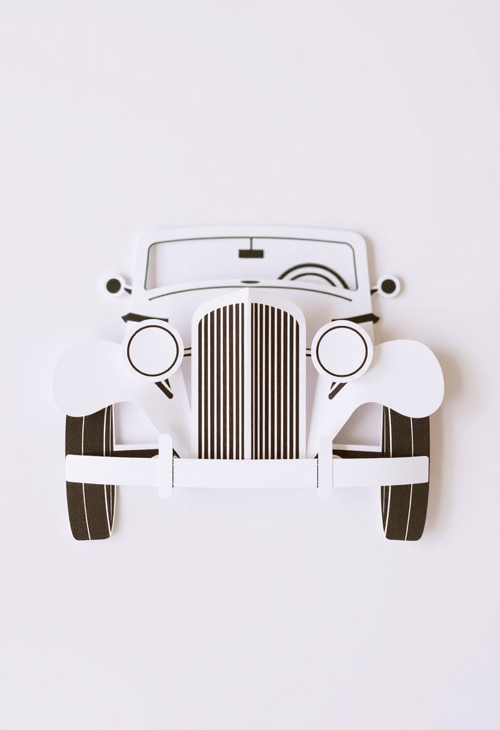 Vintage Car Showcase in Paper Cutout Style