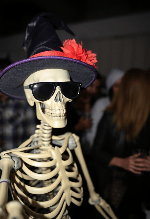 Casual Skeleton Selfie in Witch Hat